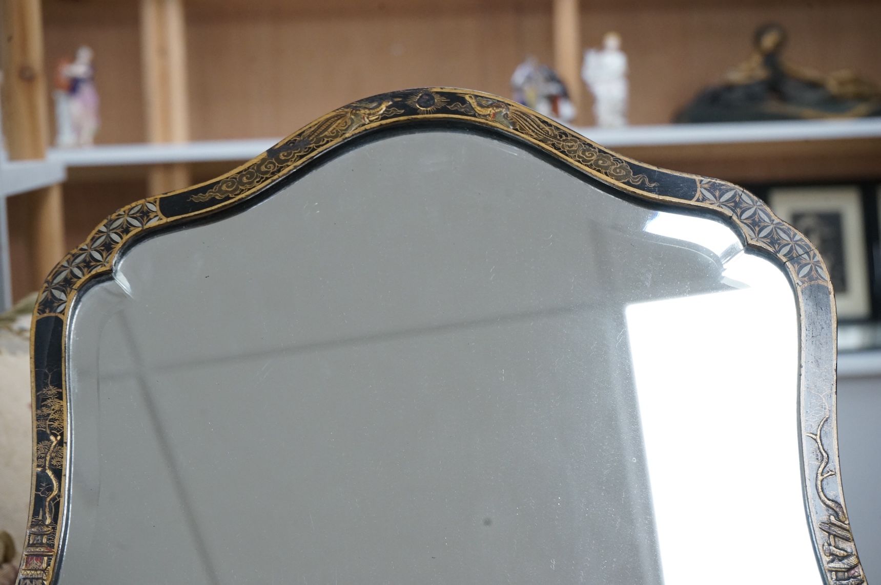 A 1920's Japanned easel mirror, 59cm high